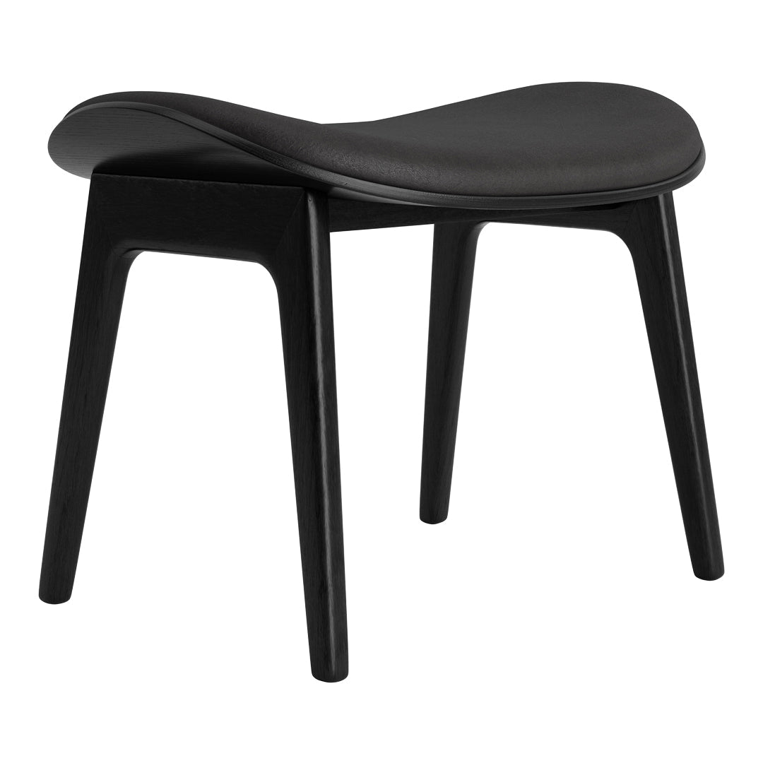Black minimalist stool with smooth curves and a sleek, monochromatic finish. Ideal for modern decor.