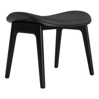 Black minimalist stool with smooth curves and a sleek, monochromatic finish. Ideal for modern decor.
