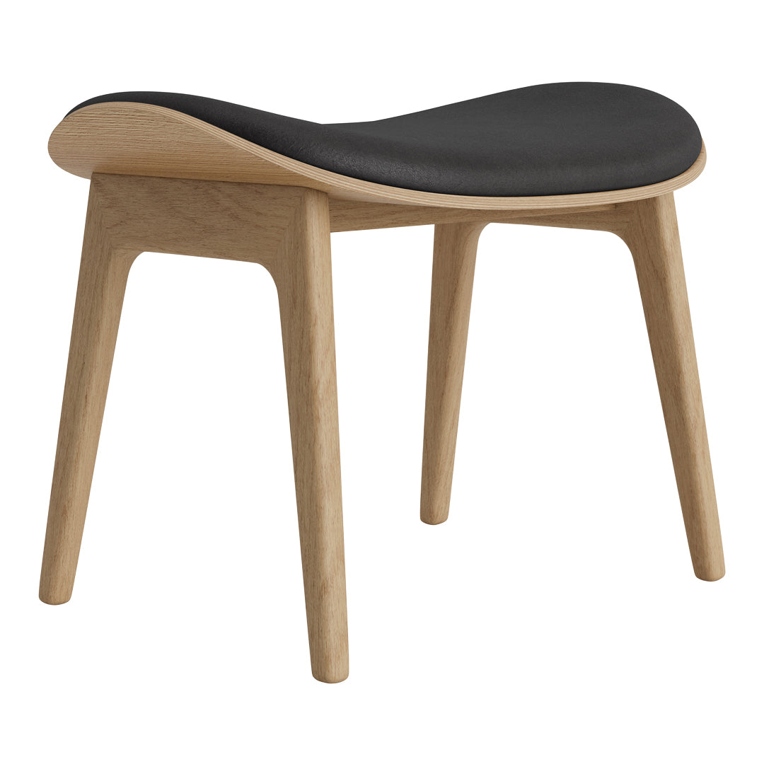 Natural wood stool with a sleek black cushioned seat, featuring a minimalist design and smooth curves.