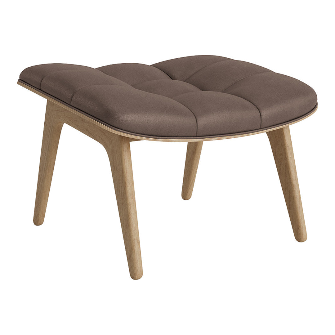 Brown tufted ottoman with wooden legs, featuring a modern design and soft fabric for a cozy look.