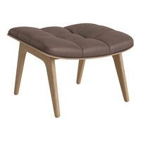 Brown tufted ottoman with wooden legs, featuring a modern design and soft fabric for a cozy look.