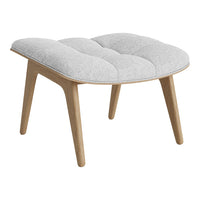 Light gray tufted cushion with a smooth wood frame and minimalist design. Modern home decor accent piece.