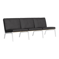 Black leather sofa with a sleek, modern design, featuring a smooth finish and silver metal legs. Perfect for contemporary spaces.