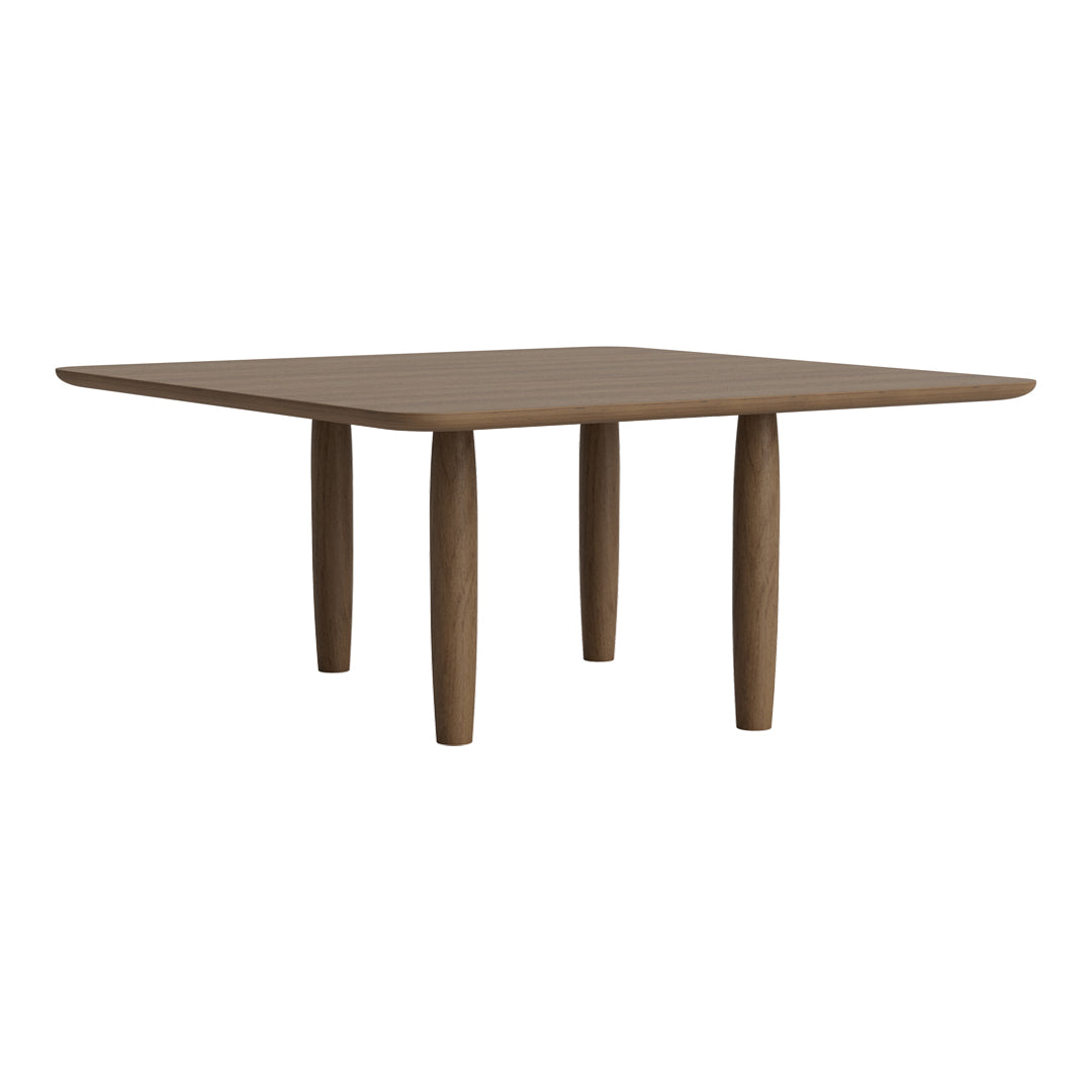 Brown wooden dining table with a smooth top and round legs, showcasing a simple and modern design.