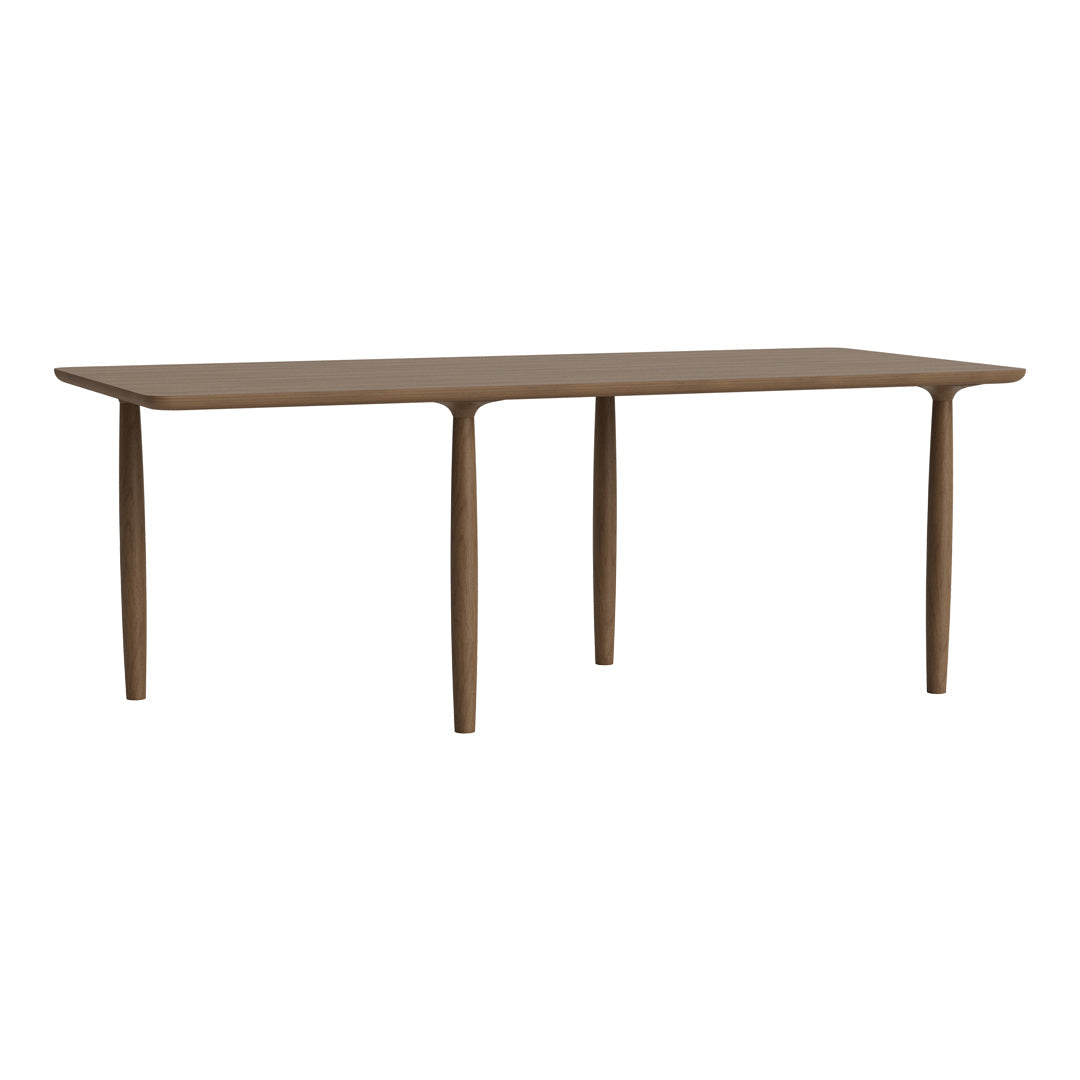 Rectangular wooden dining table in a rich brown finish with smooth edges and tapered legs. Perfect for modern decor.
