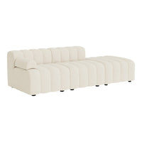 Cream-colored sofa with a textured, ribbed pattern and rounded edges, perfect for modern living spaces.