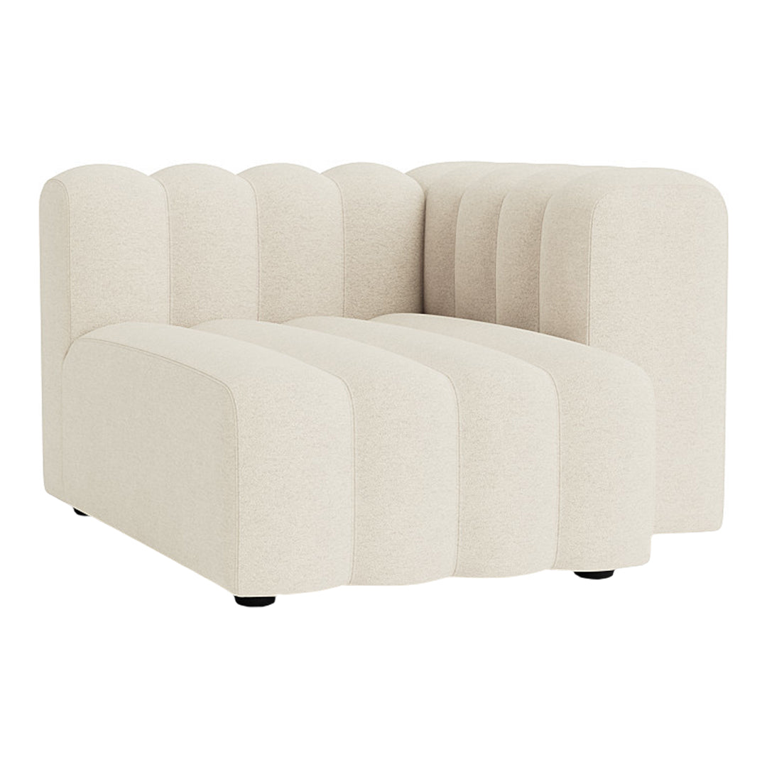 Cream-colored modular sofa with ribbed texture and sleek lines, perfect for modern decor.