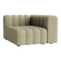 "Soft beige sectional sofa with a ribbed texture and curved silhouette, perfect for modern home decor."