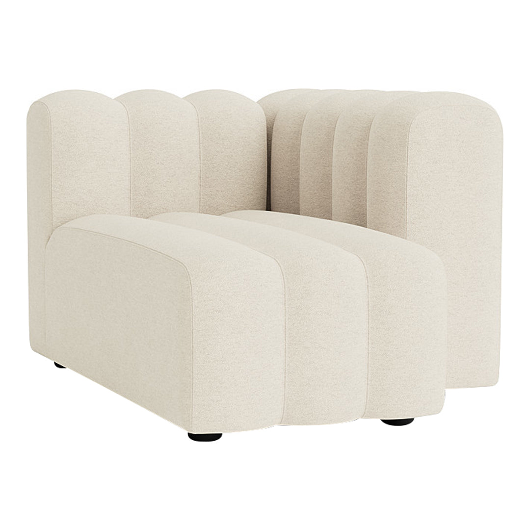 Stylish cream-colored couch with soft textured stripes, featuring a modern design and rounded edges.