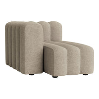 Beige curved sofa with textured fabric, featuring smooth, rounded shapes for a modern aesthetic. Perfect for cozy spaces.