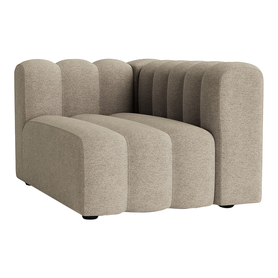 Textured beige corner sofa with a modern, curved design and subtle ribbed detailing. Perfect for contemporary decor.