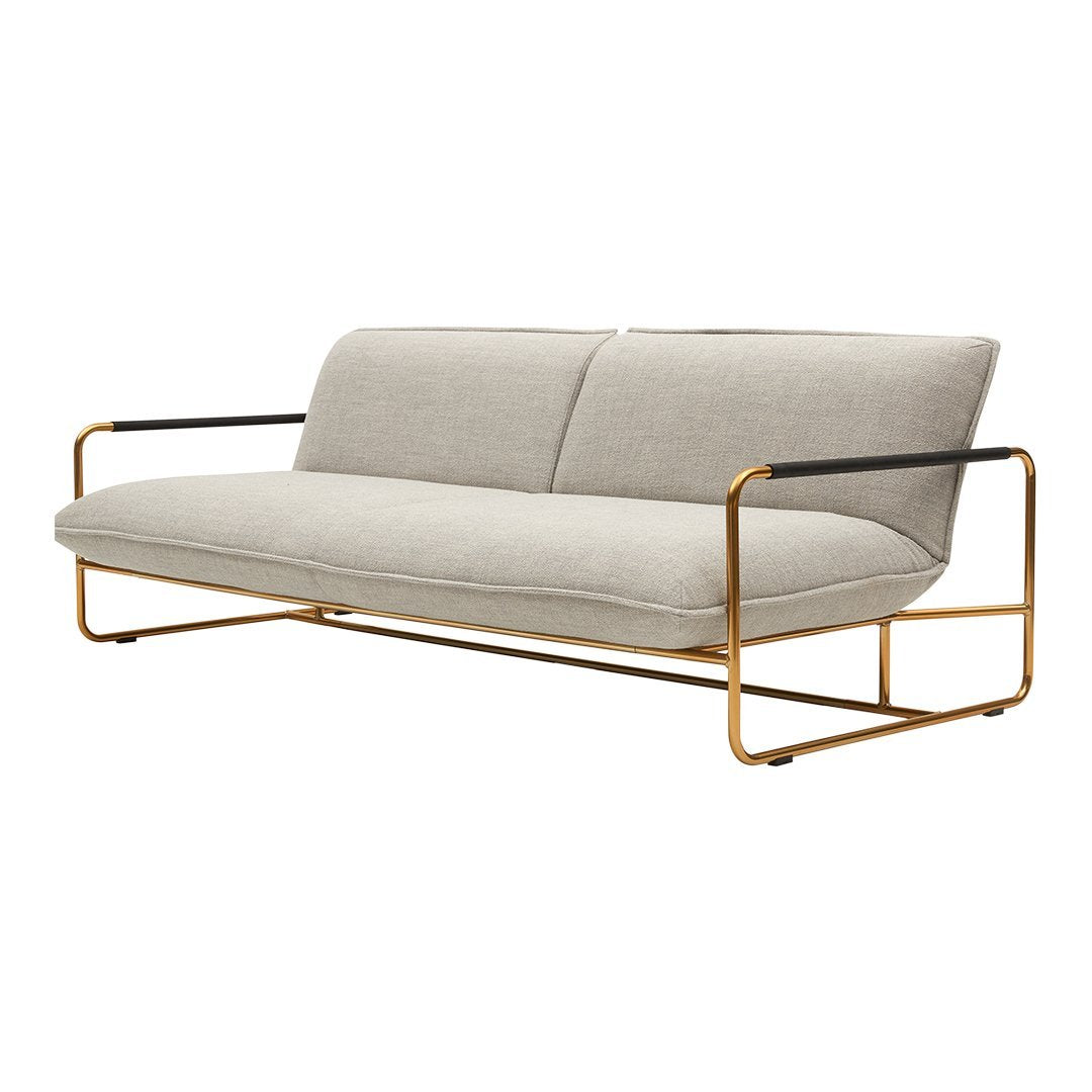 Modern gray sofa with sleek gold and black metal frame; minimalist design with clean lines and neutral color palette.