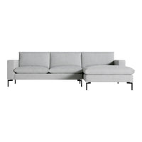 Light gray modern sofa with smooth fabric and minimalist design, featuring solid black metal legs.