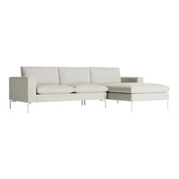 Light gray sectional sofa with a sleek, modern pattern and minimalist chrome legs. Ideal for stylish living spaces.