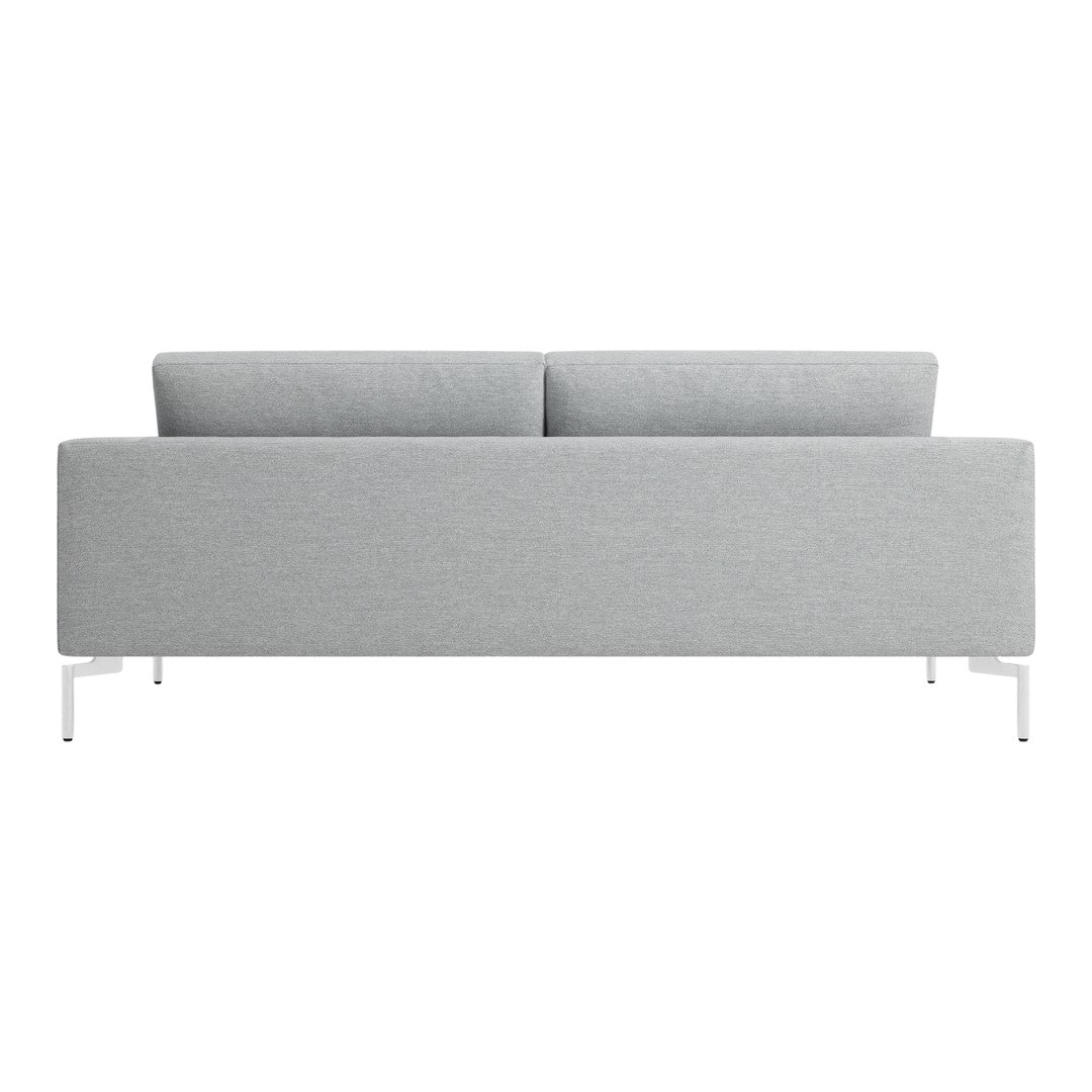 Modern gray fabric sofa with a sleek design and white metal legs, featuring a minimalist texture.