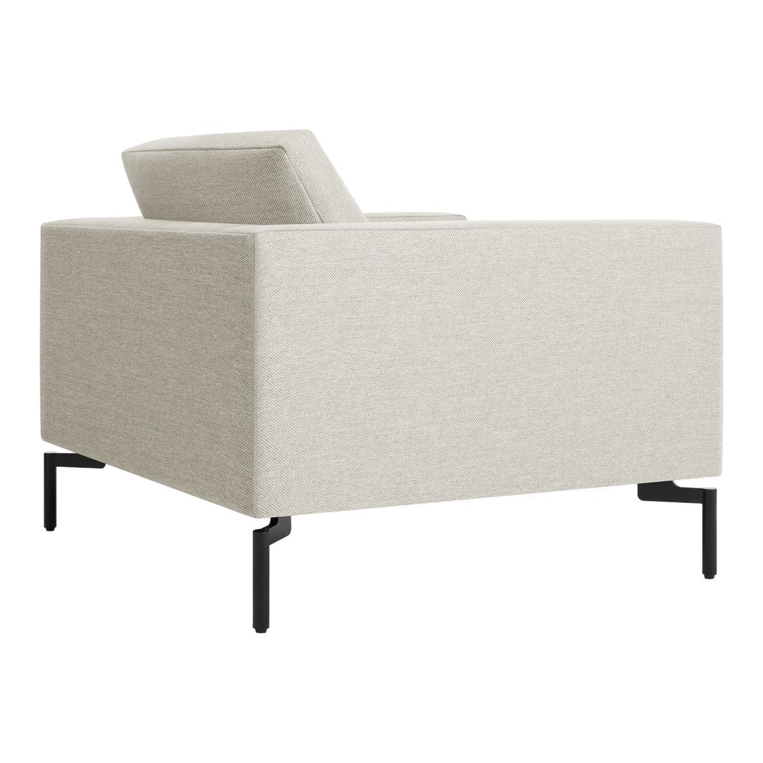 Light gray textured fabric armchair with clean lines and black metal legs. Modern and minimalistic design.