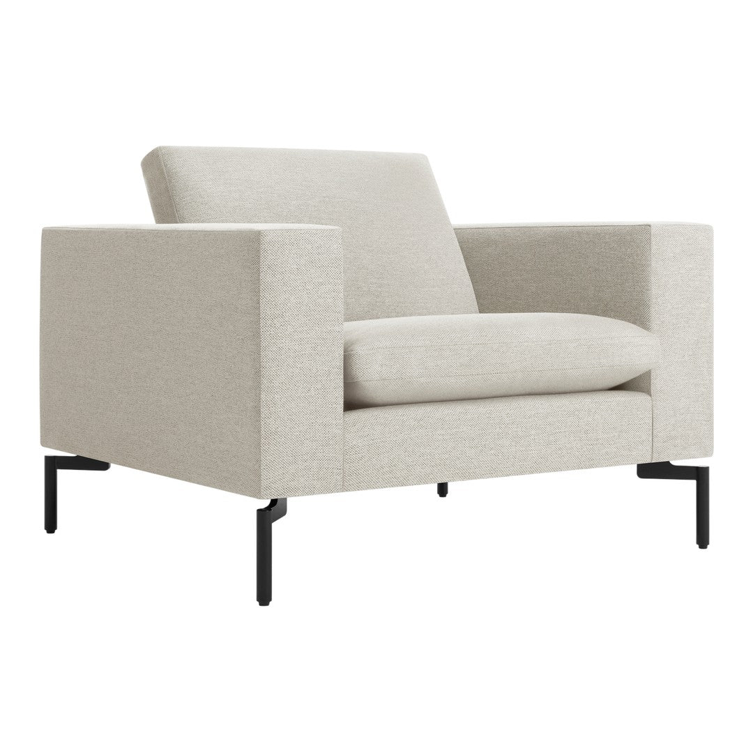 Light beige armchair with a textured fabric pattern and sleek black metal legs. Modern and minimalist design.