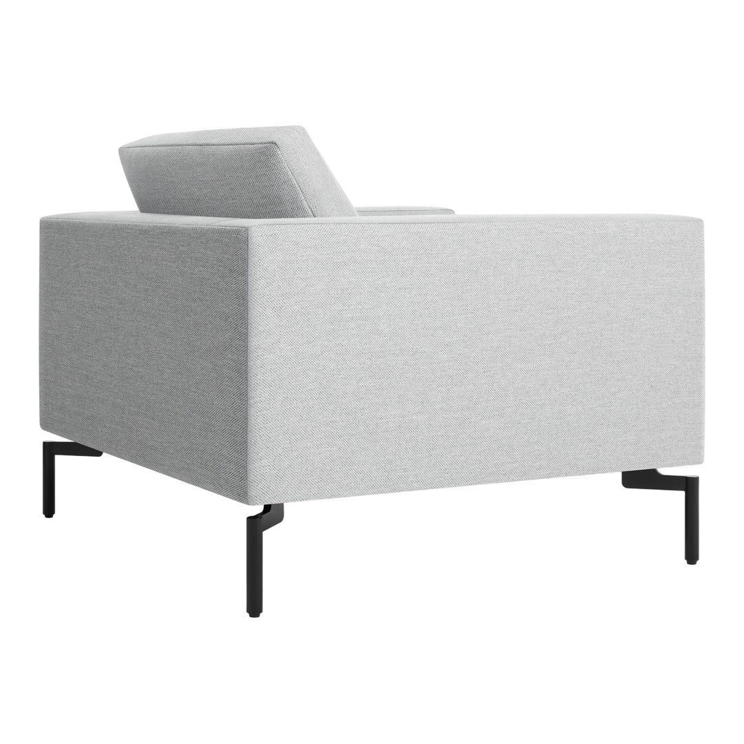 Light grey upholstered armchair with a textured pattern and black metal legs, adding modern elegance to any space.