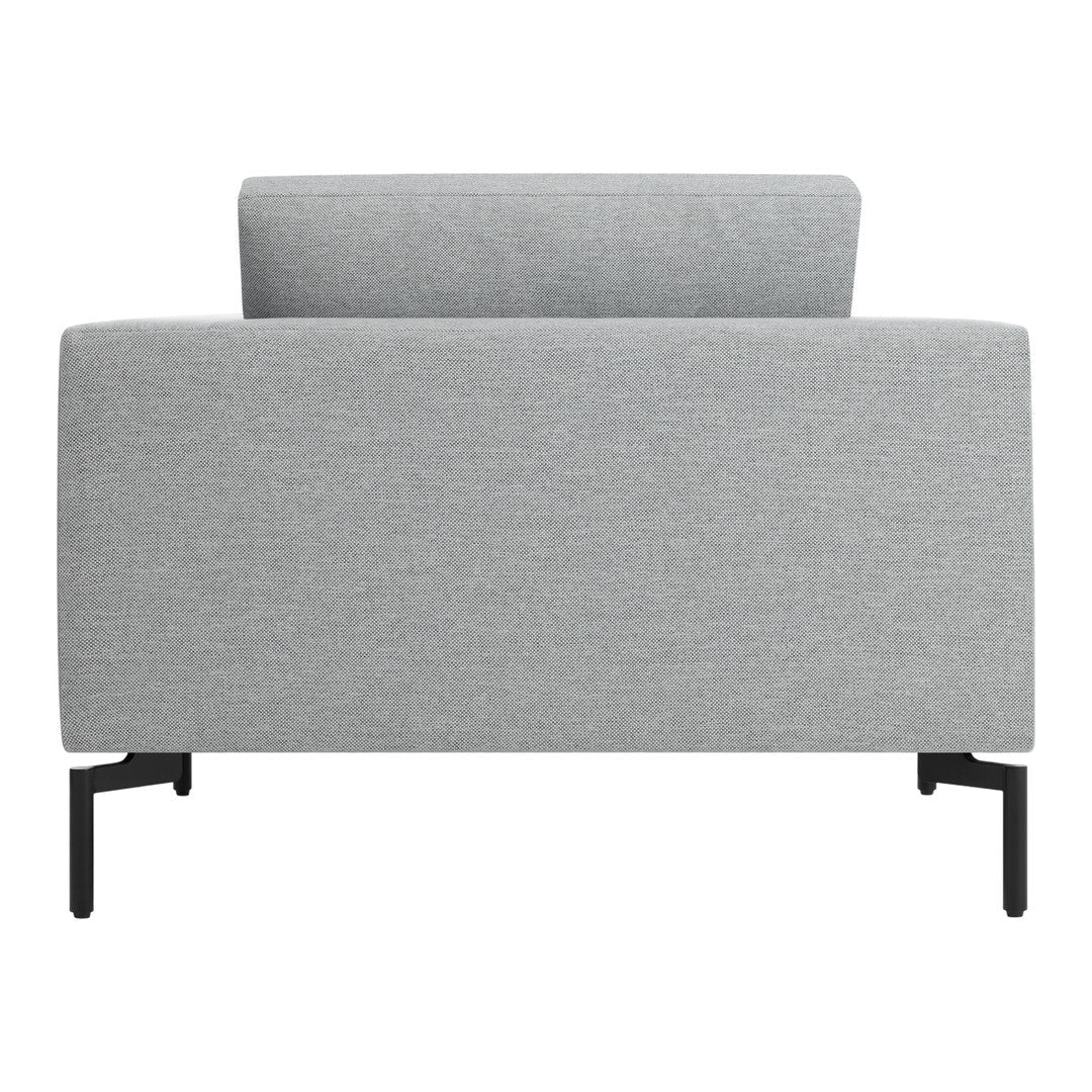 Gray upholstered armchair with a textured fabric and minimalist black metal legs. Modern and stylish design.