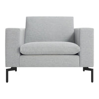 Gray upholstered chair with a sleek, modern design and textured pattern, featuring matte black metal legs.