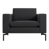 Stylish, modern armchair in solid black with a sleek, textured finish and minimalist metal legs.