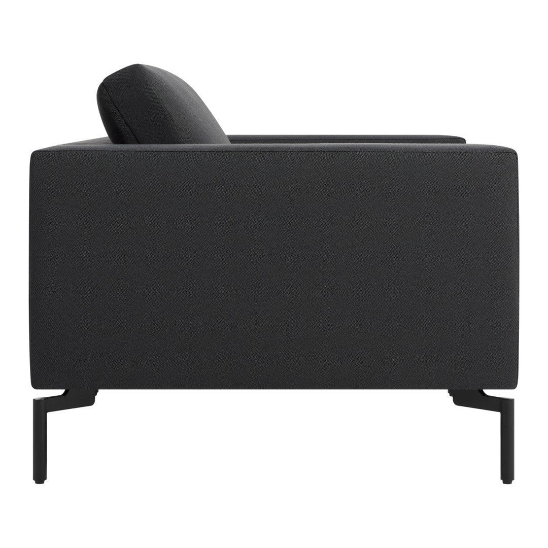 Modern black sofa with a sleek, textured fabric and minimalist design, featuring a supportive backrest.