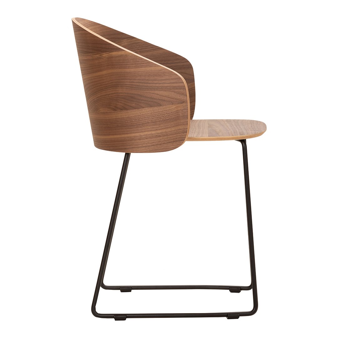 Modern wooden chair with warm walnut finish and sleek black metal frame. Minimalist design with smooth curves.