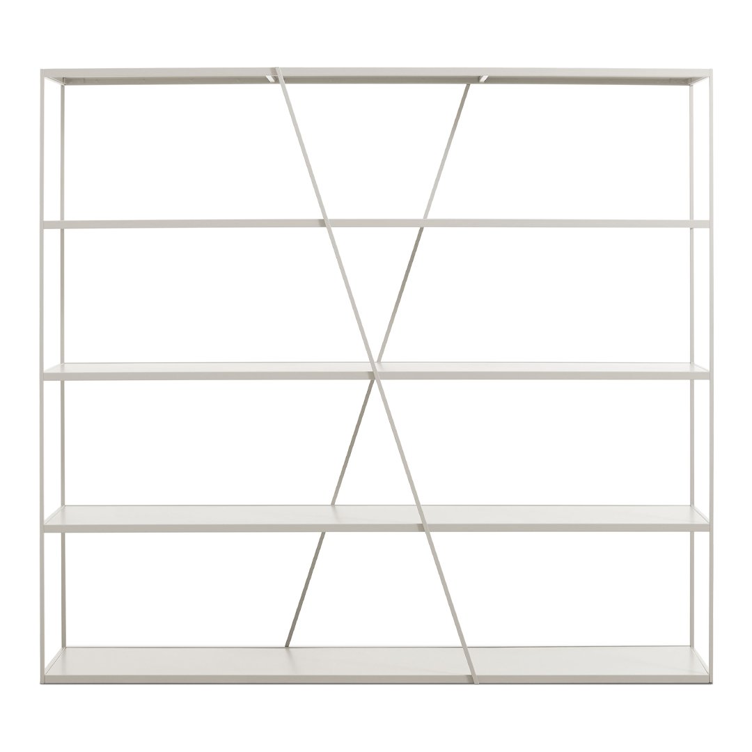 White metal shelving unit with geometric pattern and sleek lines, perfect for modern home decor.