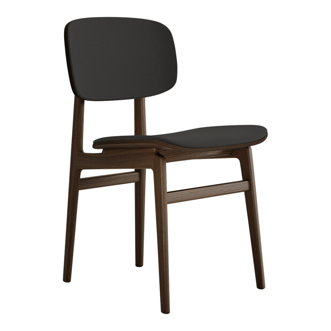 Modern black chair with a sleek, curved design and dark wood legs. Minimalist style fits any decor.