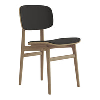 Black chair with smooth curves and natural wood frame, featuring a minimalist design and simple patterns.