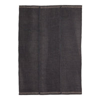 Dark gray textured rug with subtle contrasting stitching, featuring a simple, modern design. Perfect for versatile decor.