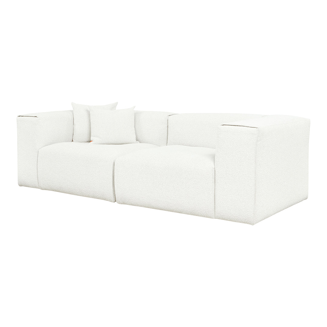 White textured sofa with plush cushions, offering a clean and modern aesthetic for any living space.