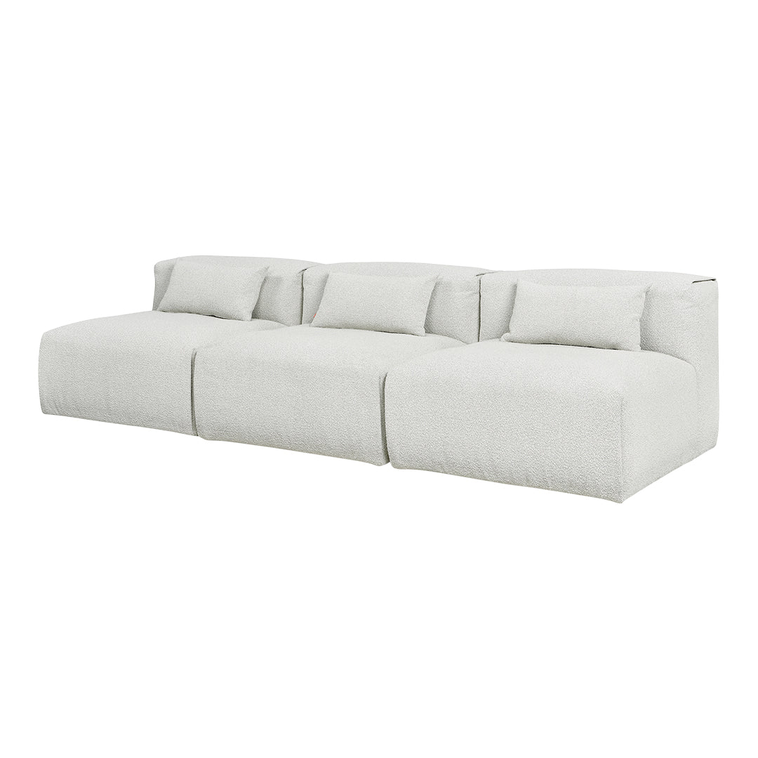 Textured light gray sectional sofa with soft, plush fabric and matching accent pillows. Ideal for modern living spaces.