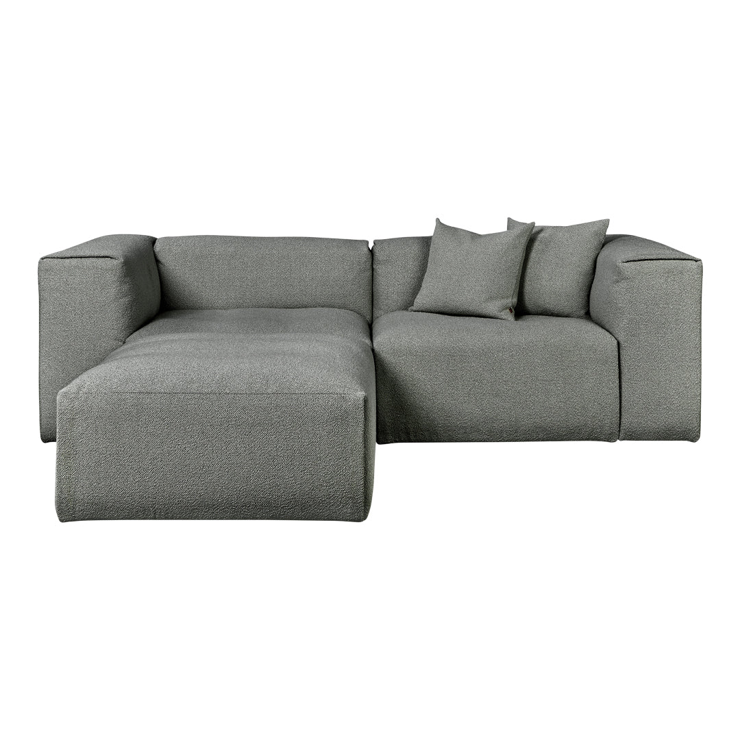 Gray sectional sofa with textured fabric and matching cushions, offering modern style and cozy comfort.