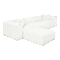 Textured white modular sofa with clean lines and minimalistic design, featuring matching white throw pillows.