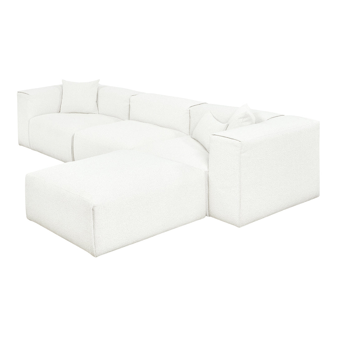 White sectional sofa with a textured fabric pattern and plush cushions, perfect for modern living spaces.