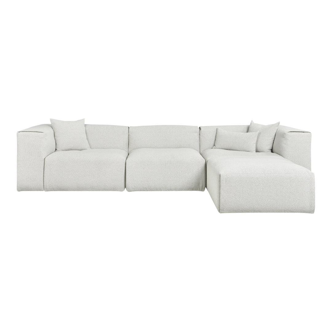 Cozy light gray sectional sofa with subtle textured pattern and plush cushions for modern living spaces.