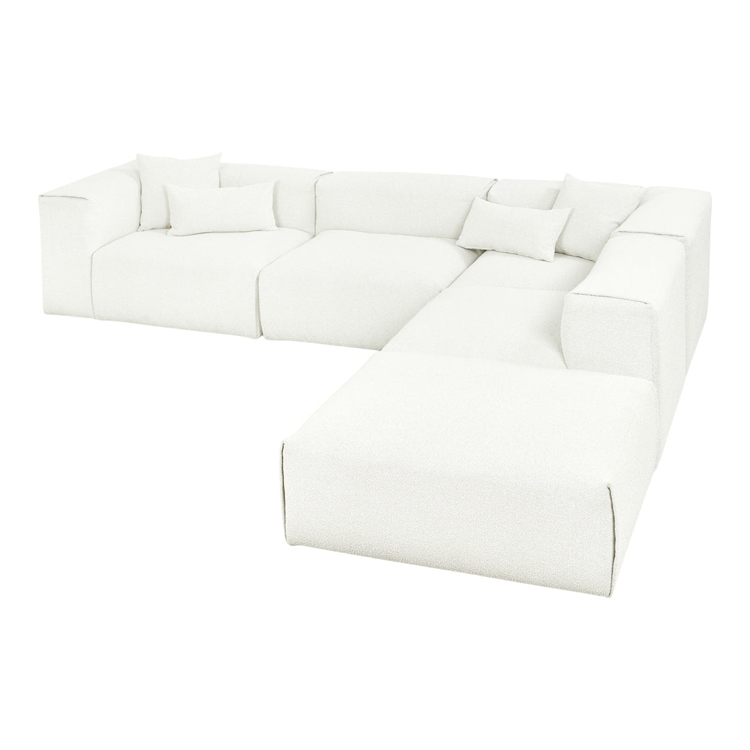 White plush sectional sofa with a clean, minimalist design and textured fabric, featuring matching throw pillows.