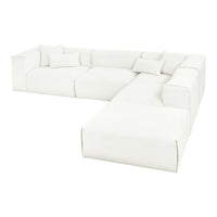 White plush sectional sofa with a clean, minimalist design and textured fabric, featuring matching throw pillows.