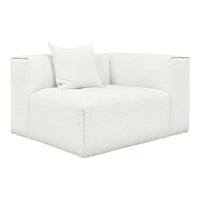 Cozy white oversized armchair with subtle textured fabric and matching pillow, perfect for modern decor.