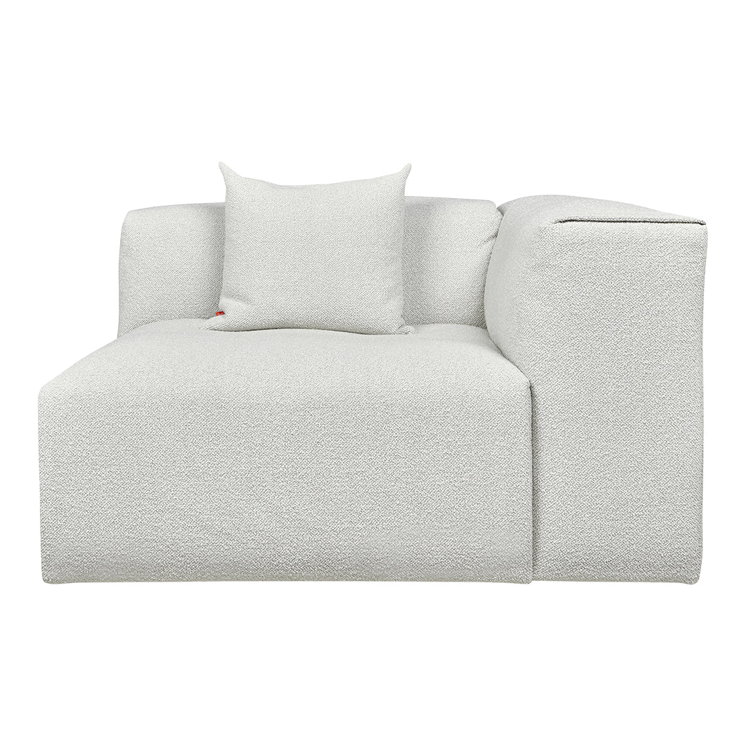 Textured cream-colored sofa with a subtle pattern, including a matching pillow for added comfort.