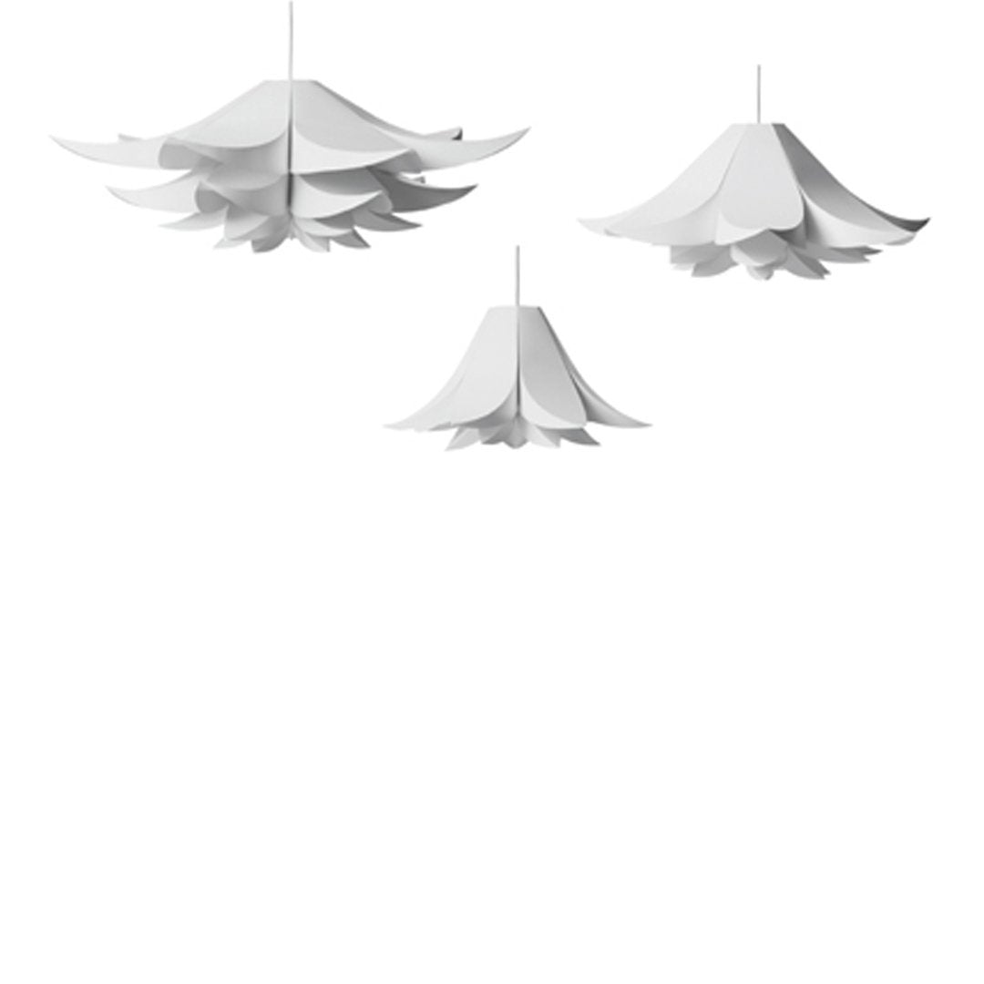 Elegant white pendant lights with layered, floral-inspired designs hanging against a minimalist background.