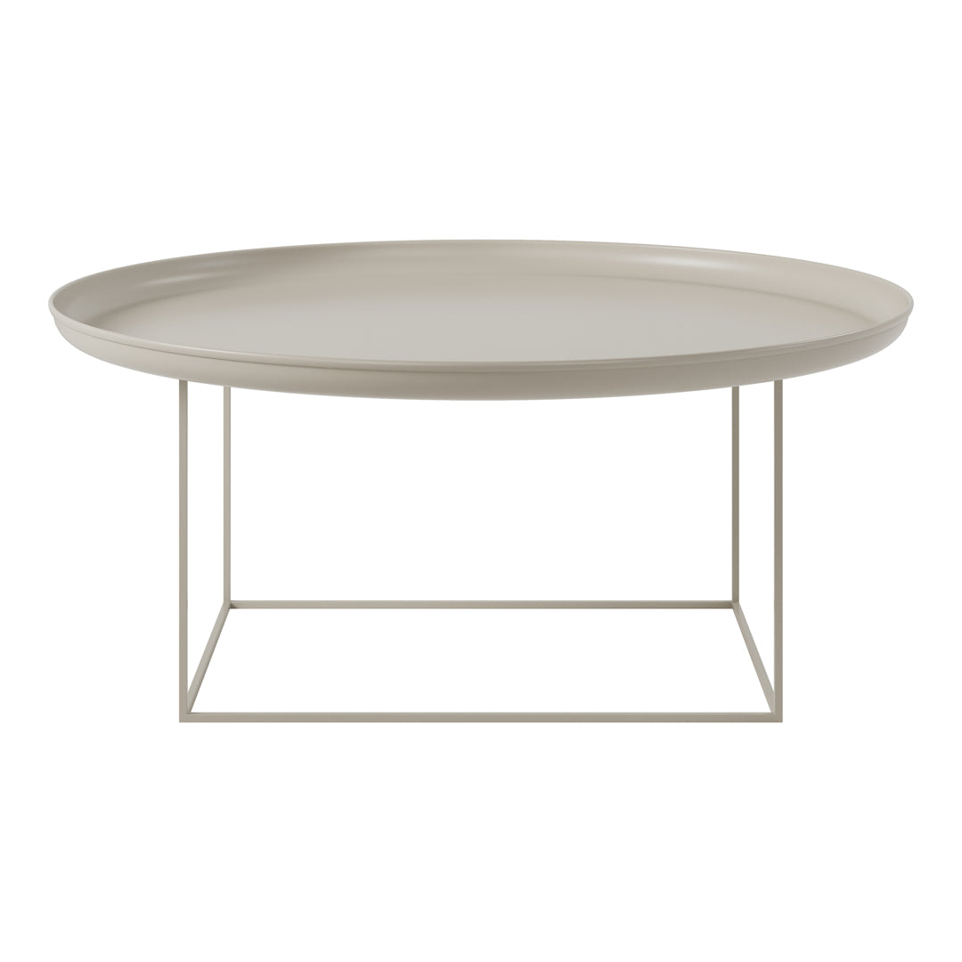Beige round coffee table with a sleek design and minimalist metal base, perfect for modern decor.