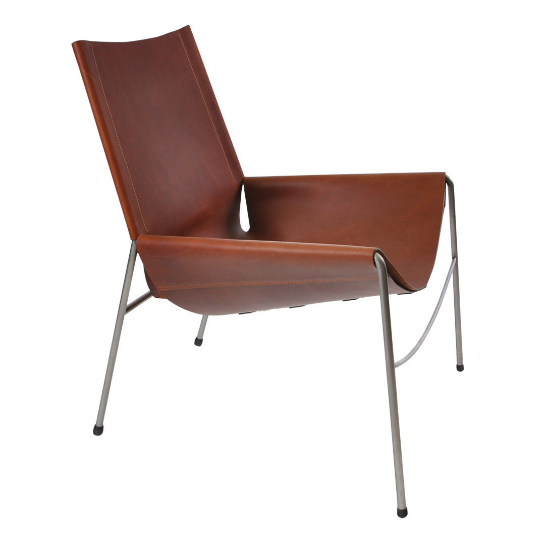Modern brown leather lounge chair with sleek metallic legs, featuring a minimalist design and streamlined silhouette.