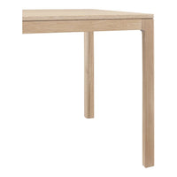 Light wood table with a smooth, neutral finish and clean lines, perfect for modern decor.