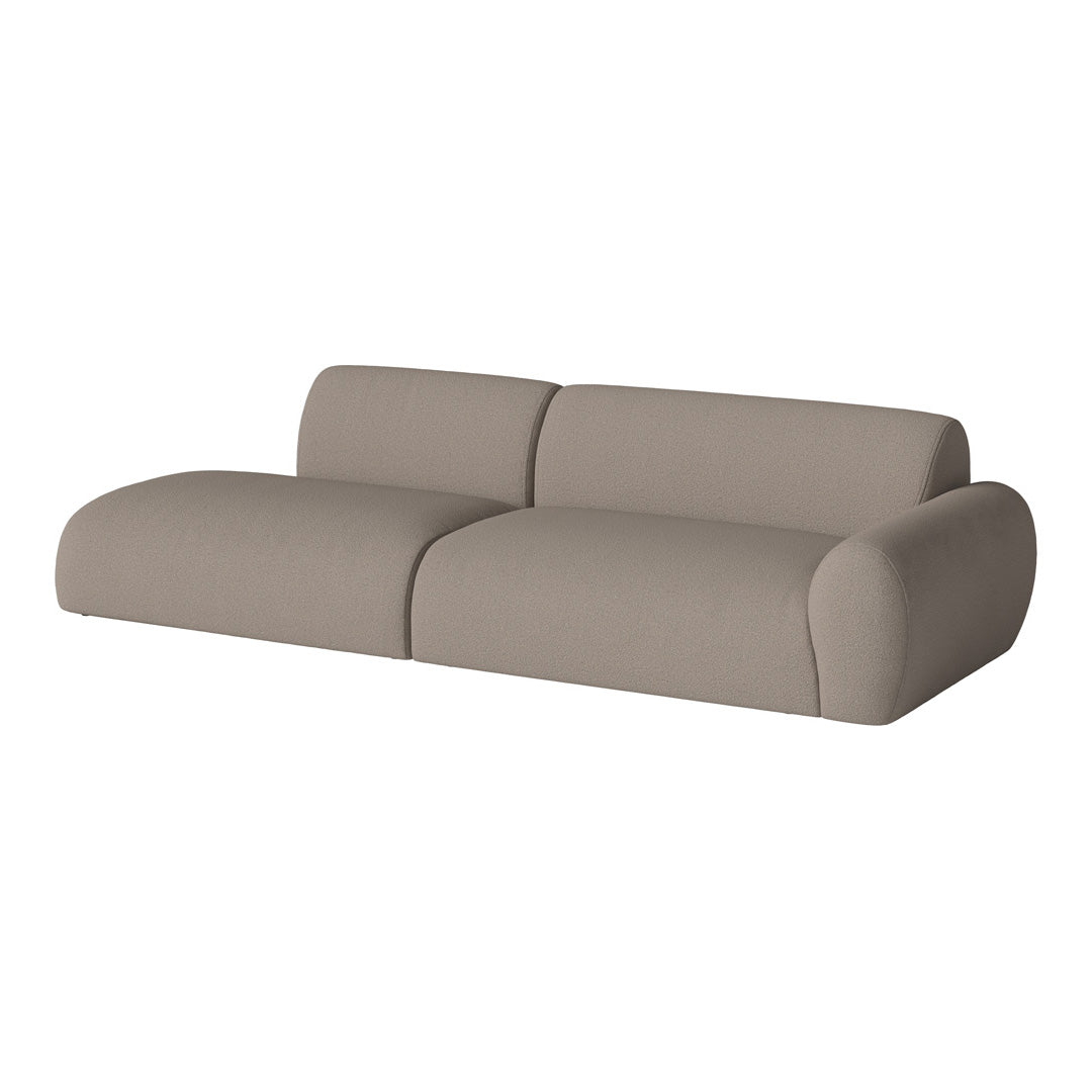 Stylish two-tone sofa in soft taupe with smooth fabric and contemporary curved design. Ideal for modern living spaces.
