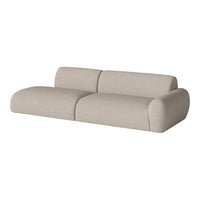 Light beige modern sectional sofa with a textured fabric and soft curved lines for a cozy living space.