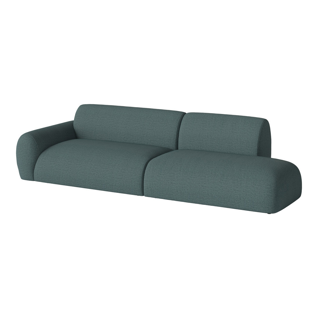 Teal upholstered modern sofa with smooth, rounded edges and a subtle textured pattern. Perfect for contemporary decor.