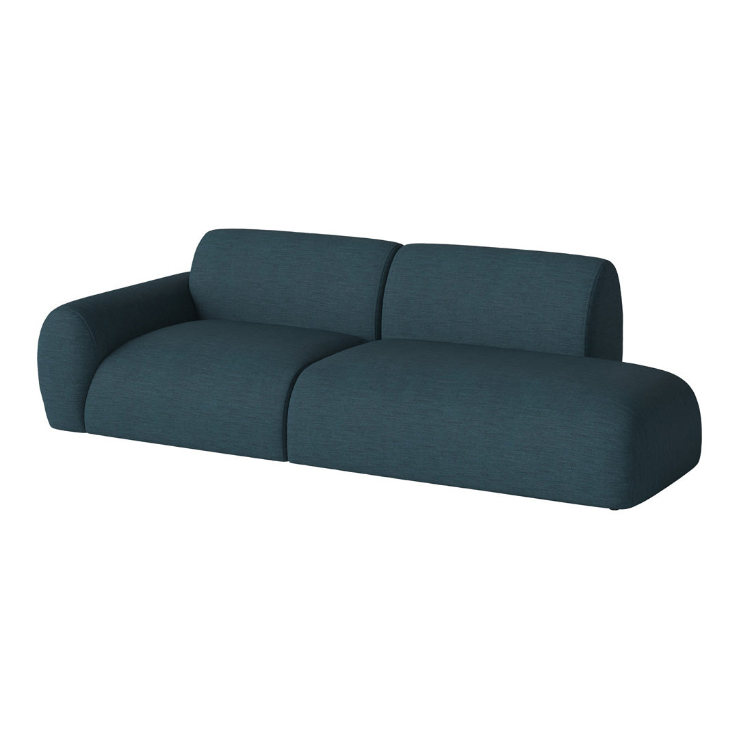 Teal upholstered sofa with a minimalist design, featuring a soft, textured fabric and no visible patterns.