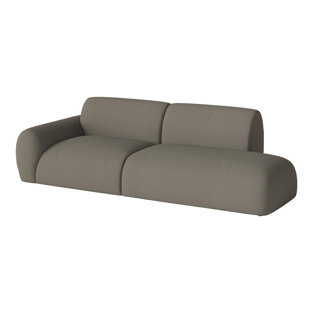 Stylish modular sofa in a soft taupe color with a smooth fabric texture, perfect for modern interiors.